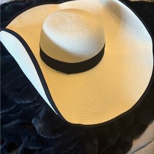 Elegant Cream Wide-Brim Hat with Black Trim. Never worn, like new.